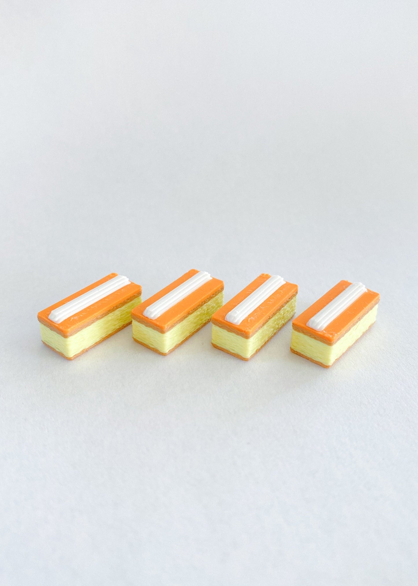 Miniature orange cream puffs