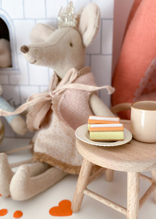 Miniature orange cream puffs