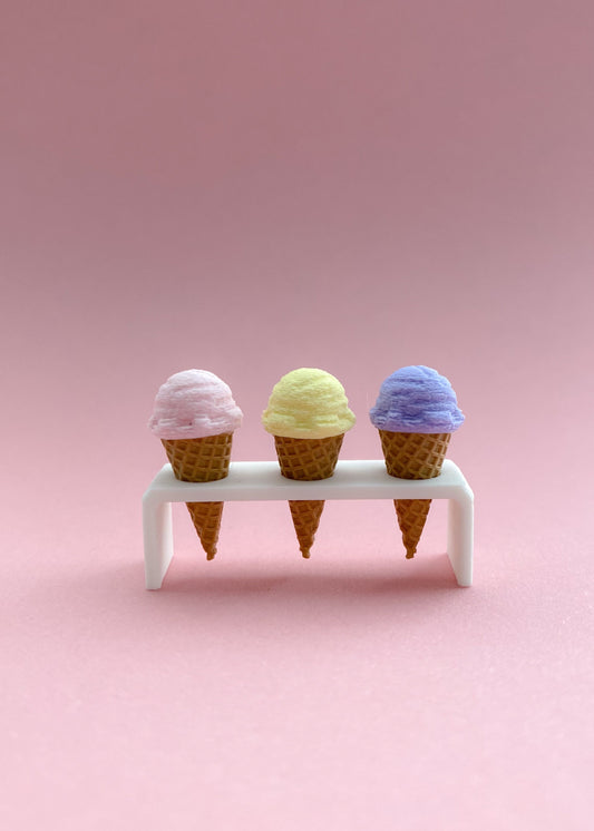 Three magnetic miniature ice cream cones with holder
