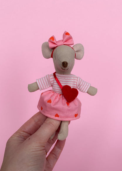 Valentine’s outfit striped shirt with heart‑print skirt