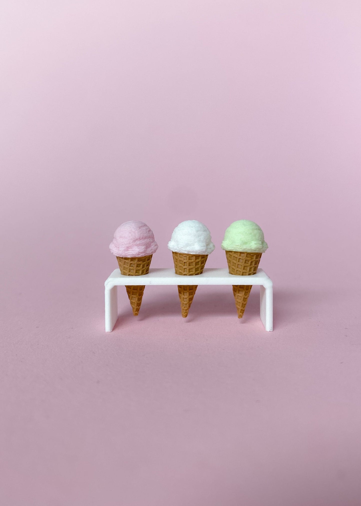 Three magnetic miniature ice cream cones with holder