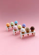 Three magnetic miniature ice cream cones with holder