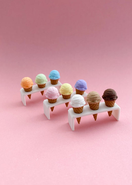 Three magnetic miniature ice cream cones with holder