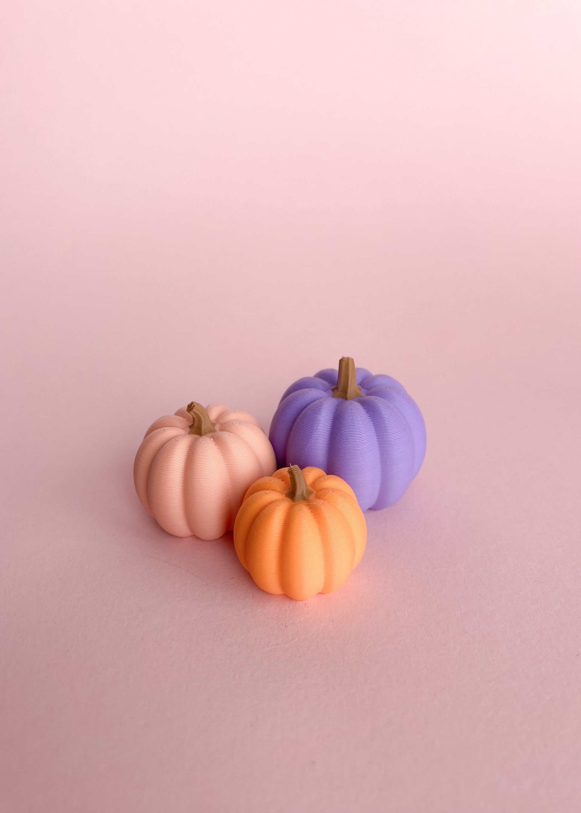 Miniatuur pompoenen paars roze oranje