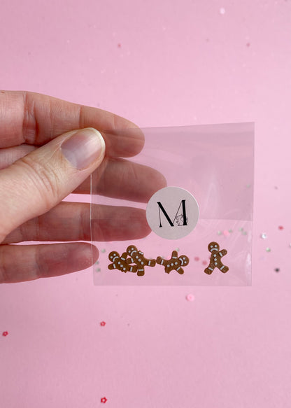 Gingerbread man cookies, partially eaten, miniature