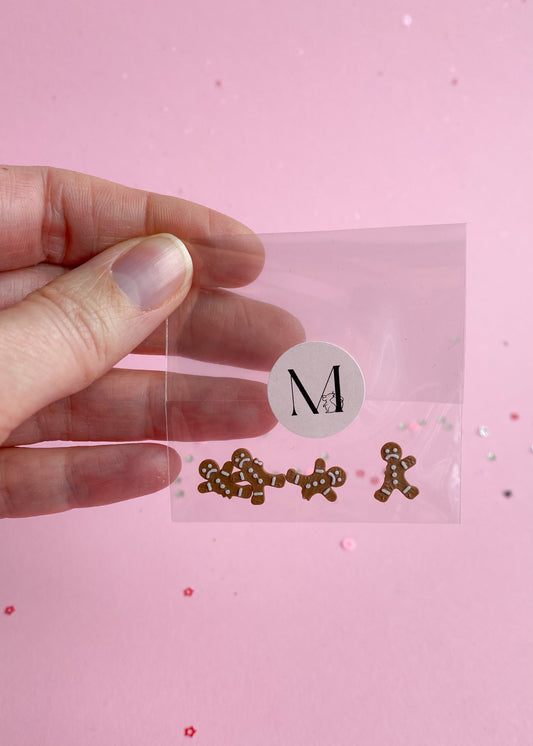 Gingerbread man cookies, partially eaten, miniature